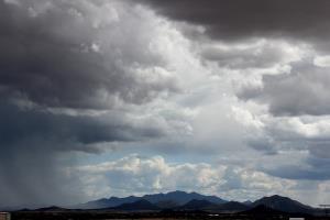 Santa Fe Baldy with rain clouds seen from Santa Fe Regional Airport