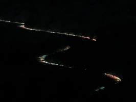 Cars at night leaving Alpine Meadows
