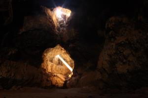 Lights from inside lava tube cave