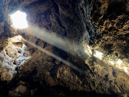 Light from opening in lava tube cave
