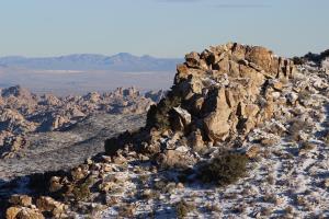 Rocks with snow in morning on Ryan Mountain