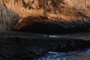 Cave near water at Shark Fin Cove