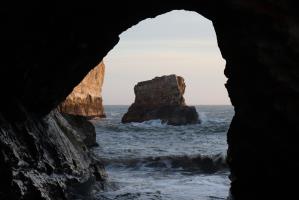 Looking through opening on beach at Shark Fin Cove