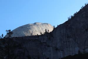 Half Dome peaking out in morning sunlight