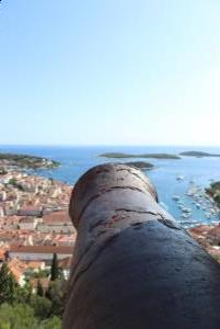Up close of canon and Hvar Town