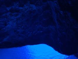 Inside Blue Cave with blue cave walls