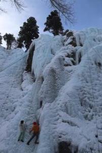 Climber in Ouray Ice Park with guide
