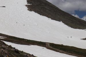 People skiing down Peak 10