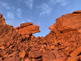 5:54AM looking up at Keyhole as first sunlight from sunrise hits