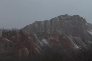 Rocks seen up close while it snows in Roxborough State Park
