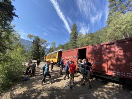 Hikers getting off of the Durango and Silverton Narrow Gauge Railroad train