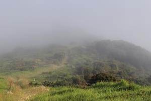 Hiking up towards radar station in fog