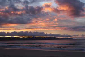 Sunset clouds at Spirits Bay