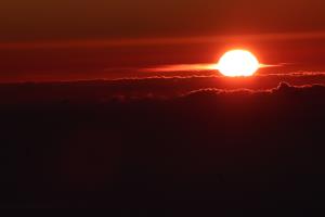 Close up of sun setting at summit