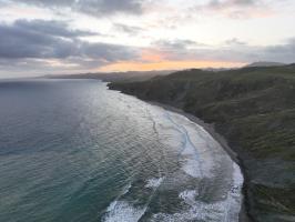 View past Castle Rock near sunset