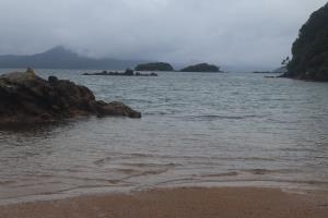 Beach on Ulva Island with low clouds