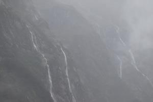 Waterfalls seen through fog