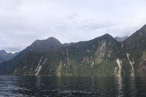 Fiords with ocean seen from boat in Milford Sound