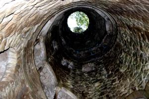 Looking up at bottom of well