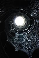 Looking up at bottom of well