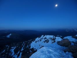 At the summit of Bierstadt before sunrise with almost full moon