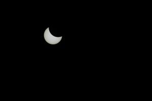 Moon covering large part of sun during eclipse