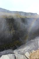 Rainbow created from mist at Dettifoss waterfall