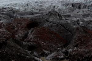 Up close of glacier with dirt on it