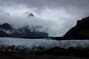 Glacier with clouds and mountains