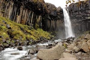 Svartifoss waterfall with river running from it