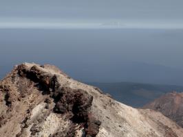 Mt. Shasta with smoke under it seen from Lassen Peak summit