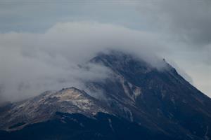 Clouds over a mountain on Lake Manapouri