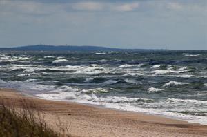 Curonian Spit sand dunes and beach with waves